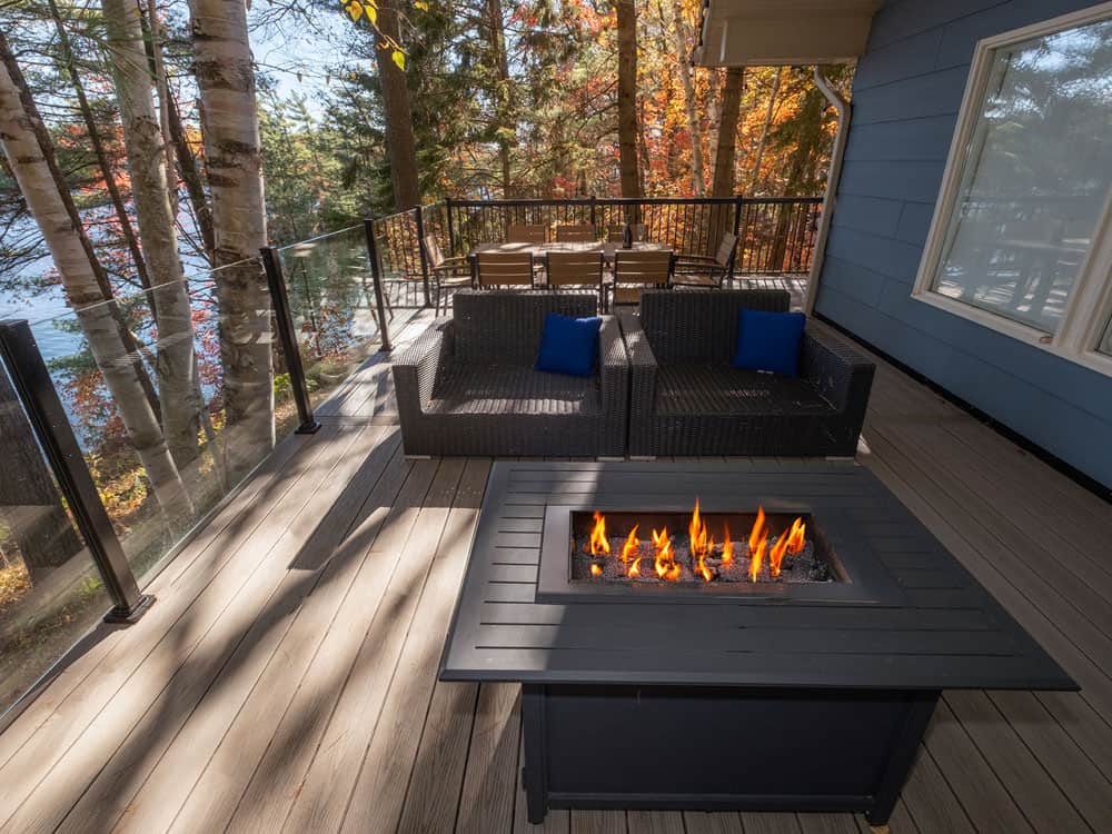 fire pit and glass railings on Muskoka deck
