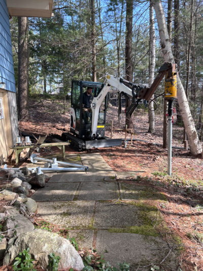 helilcal piles being driven into the ground